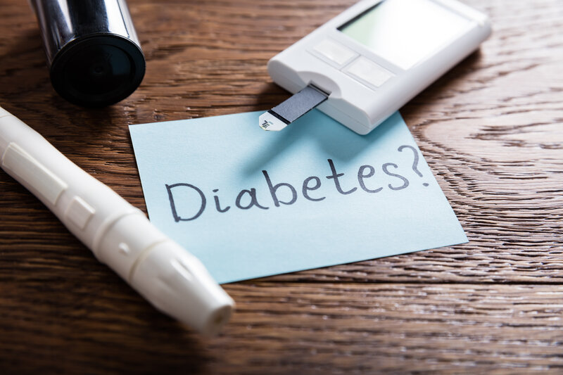Diabetes Concept With Diabetes Medication On Wooden Desk
